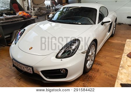 Novosibirsk, Russia - 08.01.18: Front View Of Luxury Very Expensive New White Porsche Cayman Coupe S