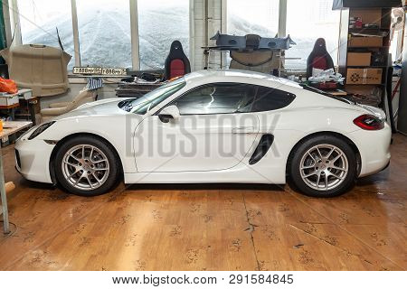 Novosibirsk, Russia - 08.01.18: Side View Of Luxury Very Expensive New White Porsche Cayman Coupe Sp