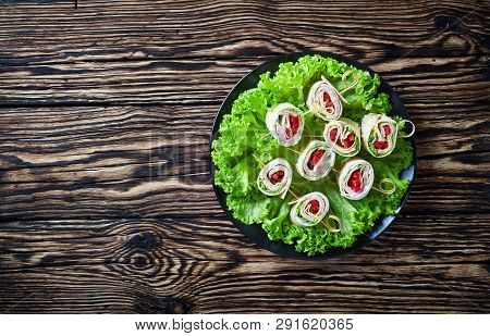 Overhead View Of Sliced Sandwich Wraps On A Skewers. Roll-ups Of Whole Grain Flatbread With Yogurt S