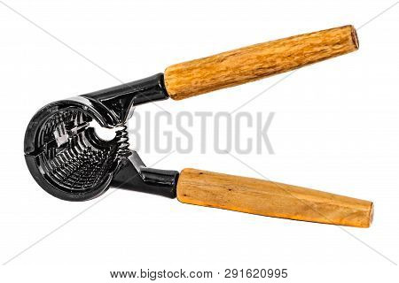 A Black Metallic Nuts Forceps With Yellow Wooden Handles Isolated On A White Background