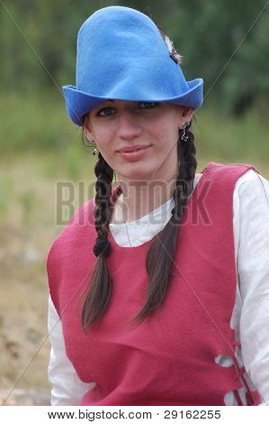 KIEV, UKRAINE - JULY 31: Member of history club Golden Capricorn wears medieval costume as she participates in historical festival in memory of King Vladimir July 31, 2009 in Kiev, Ukraine.