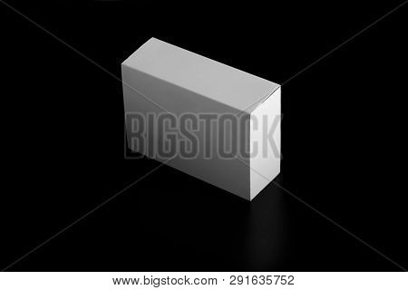 Whitebox. Carton Moving Box. White Cardboard Box Isolated On Black