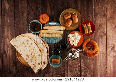 Middle Eastern Or Arabic Dishes And Assorted Meze, Concrete Rustic Background. Turkish Bread Or Turk