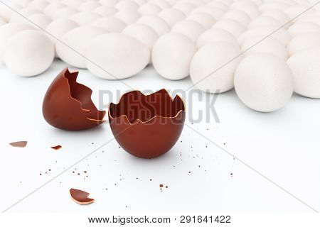 One Chocolate Egg Broken On Two Pieces. Chocolate Egg Around White Eggs, Concept Individuality, Excl