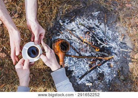 Lovers Of Men Make Coffee On The Fire In The Turk.