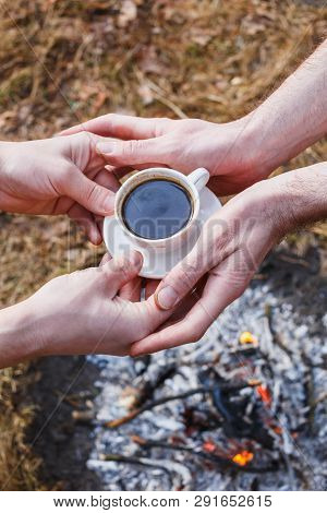 Lovers Of Men Make Coffee On The Fire In The Turk.
