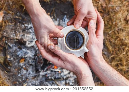 Lovers Of Men Make Coffee On The Fire In The Turk.