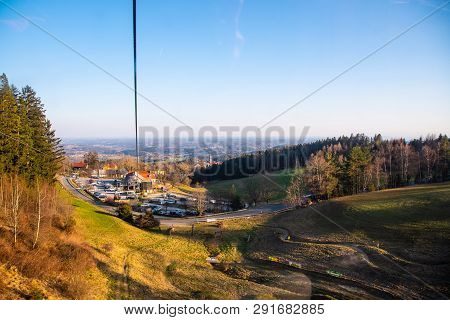 View From Gondola Lift On A Way Up Schockl Mountain In Styria Graz. Place For Tourism And Hiking Rec