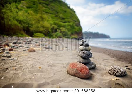 Stack Of Stones Balanced On Rocky Beach Of Pololu Valley, Big Island, Hawaii