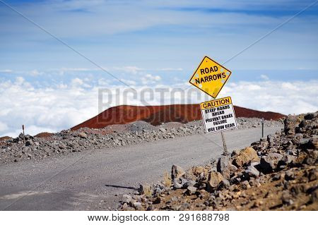 A Road Sign On A Steep Road To The Summit Of Mauna Kea, A Dormant Volcano On The Island Of Hawaii. T