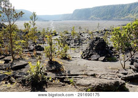 Stunning View Of The Kilauea Iki Volcano Crater Surface With Crumbling Lava Rock In Volcanoes Nation