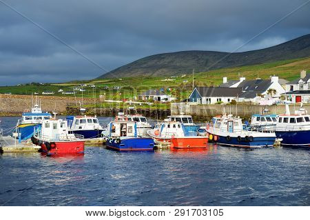 Colorful Fishing Boats And Yachts At The Harbor Of Portmagee Town On The West Atlantic Coast Of Irel