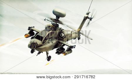 Attack Apache Longbow Helicopter Gunship Engaging A Target Firing Its Rockets. 3d Rendering