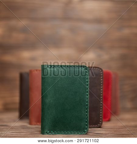 Soft Focus Photo Of Green Colour Handmade Leather Cardholder. Blurred Background On Photo. Different