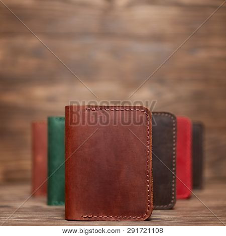 Soft Focus Photo Of Ginger Colour Handmade Leather Cardholder. Blurred Background On Photo. Differen