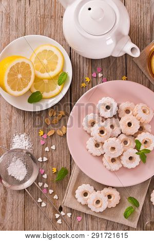 Canestrelli Biscuits With Mint On Wooden Table.