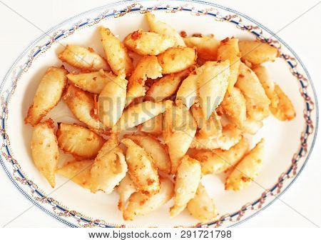 Plate With Squid At A Greek Tavern - Traditional Mediterranean Seafood
