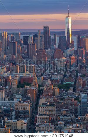 Color Landscape Photo Of The Freedom Tower In New York City. Tower Is Reflecting The Sun, Orange And