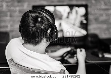 Technology, Gaming, Entertainment And People Concept - Young Man In Headset And Glasses With Pc Comp