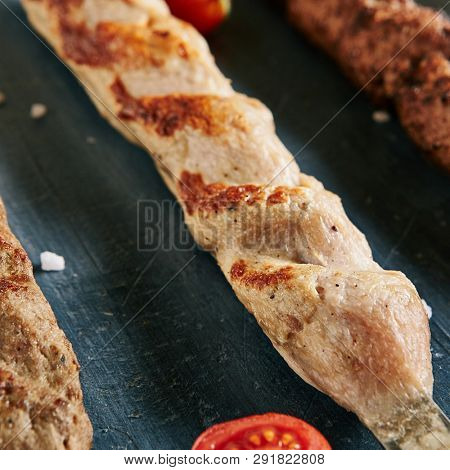 Set of Restaurant Barbecue Menu Various Lyulya Kebab and Sause Collection on Luxury Black Stone Top View. Lule Kebabs Bbq with Beef, Chicken and Mutton on Skewers Flat Lay