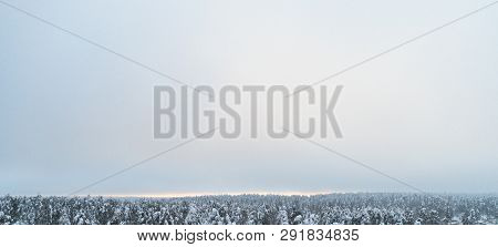 Aerial View Clouds Over Forest During Winter Colors. Aerial View Of Forest And Clouds. Aerial Drone 