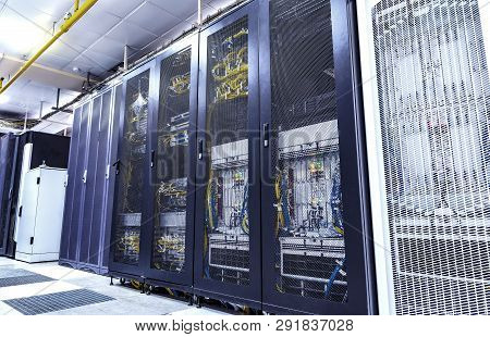 Inside Of The Equipment For Mobile Communication In Modern Data Center Of Mobile Operators. Cabinets