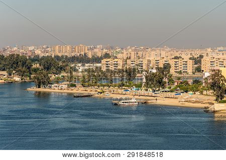 Ismailia, Egypt - November 5, 2017:  Cityscape Of Ismailia On The Lake Timsah From Ship Passing Suez