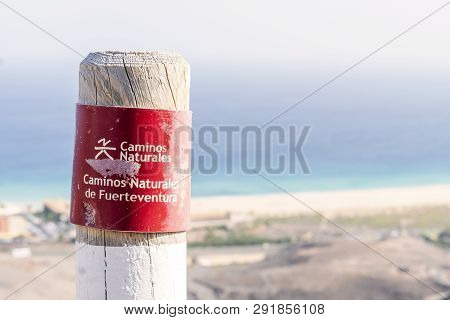 Post On The Fuerteventura Mountains Informing Hikers About The Trail.