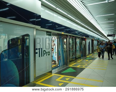 Jakarta, Indonesia - March 23, 2019: People Getting On The Train At Bundaran Hi Mrt Station.