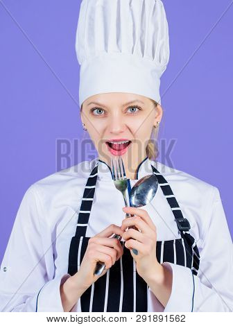 Im A Great Cook. Sensual Lady Cook. Pretty Cook Holding Stainless Steel Spoon And Fork. Professional