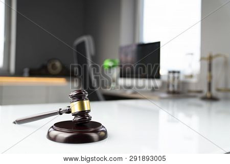 Lawyers Office. Gavel, Scale And Computer On The White Table.