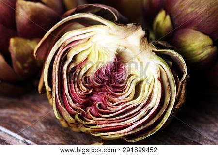Artichokes On Grey Background. Fresh Organic Artichoke Flower Vegetable