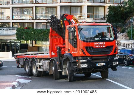Monte-carlo, Monaco - March 12, 2019: Red Truck Iveco Trakker In The City Street.