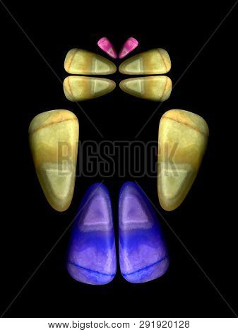 Figures Laid Out By Children From Multi-colored Pebbles. Figure From Multi-colored Stones. Stone Fig