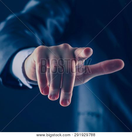Businessman Hand Pressing An Imaginary Button On The Virtual Scr