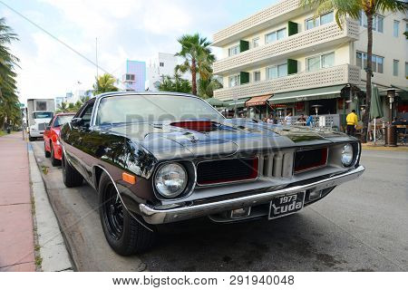 Miami - Dec 24, 2012: 1973 Plymouth Barracuda On Ocean Drive In South Beach, Miami Beach, Florida, U