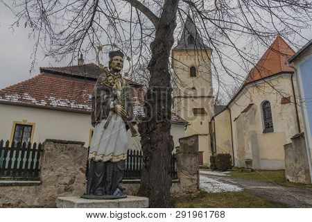 Lomnice Nad Luznici Old Town With Church In Cold Dark Winter Day