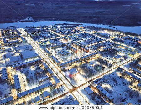Aerial View Of Town Lodeynoe Pole, City In The Evening, Winter Cityscape, Russia.
