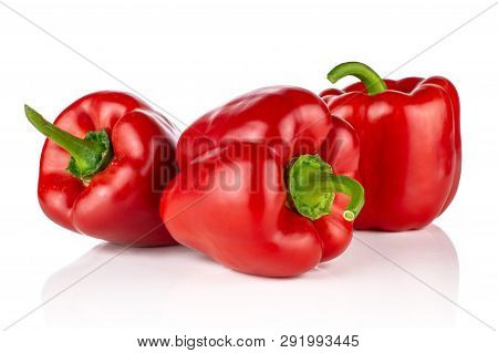 Group Of Three Whole Bulgarian Red Bell Pepper Isolated On White Background