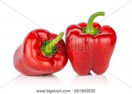 Group Of Two Whole Bulgarian Red Bell Pepper Isolated On White Background