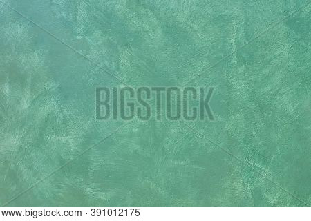 The Texture Of The Wall With Brush Strokes Of Light Green Paint. Wall Background With Light Green Pa