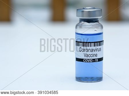 Coronavirus Ncov Vaccine In Bottle On White Background With Space For Text. Victory Over Corona Viru