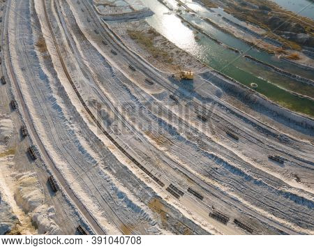 Opencast mining quarry - Aerial view. Industrial Extraction of lime, chalk, calx, caol