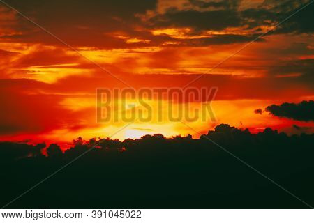 Dark Clouds And Red Sky In The Twilight