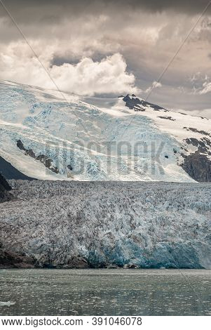 Sarmiento Channel, Chile - December 11, 2008: Amalia Glacier. Portrait Of Part Of Blueish Melting Po