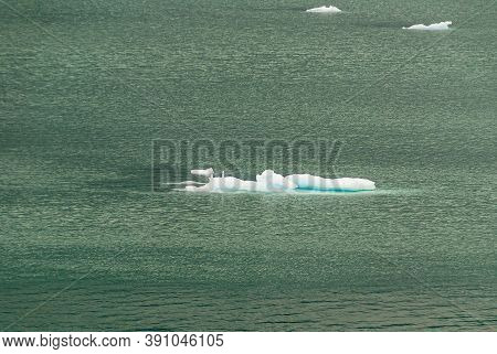 Sarmiento Channel, Chile - December 11, 2008: Amalia Glacier, Closeup Of 3 Disintegrated Pieces Of I