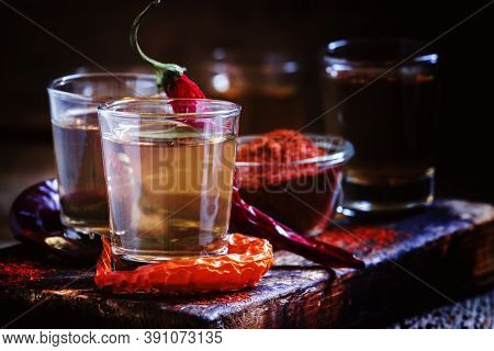 Traditional Ukrainian Vodka With Pepper Gorilka, Dark Vintage Wooden Background, Rustic Style, Selec