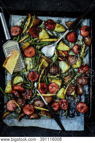 Oven Roasted Potatoes And Sausage Pan Dinner.1..style Rustic.selective Focus