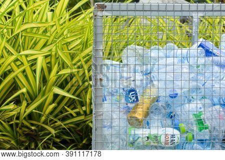 Phang Nga, Thailand -  October 16, 2020 : Empty Beverage Bottles In The Trash Bin, Plastic Bottles T