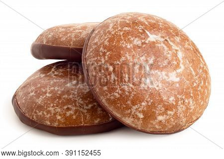 Three Glazed Gingerbread Lebkuchens With Chocolate Isolated On White.